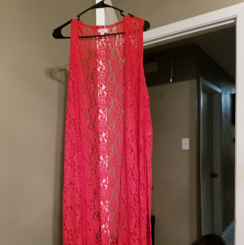 Red lace over vest